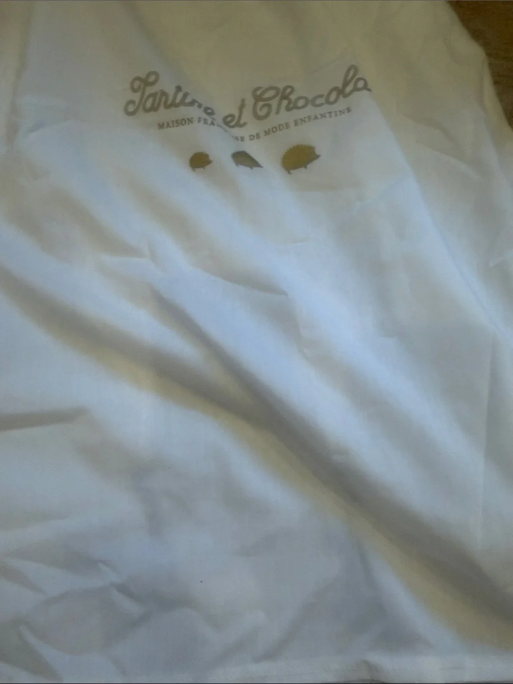 Tartine et Chocolat White Garment Bag with Gold Hedgehog Accents